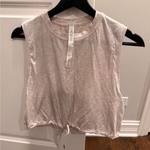 Lululemon Muscle Sleeveless Top in pink Cream size 6